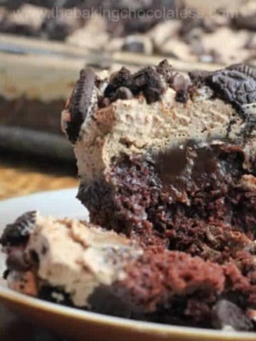 Hot Fudge Oreo Chocolate Poke Cake - The Baking ChocolaTess