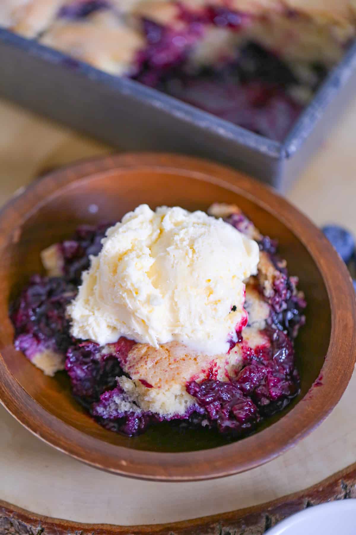 easy homemade blueberry cobbler recipe with warm buttery biscuit, cake-like crust and juicy blueberries filling