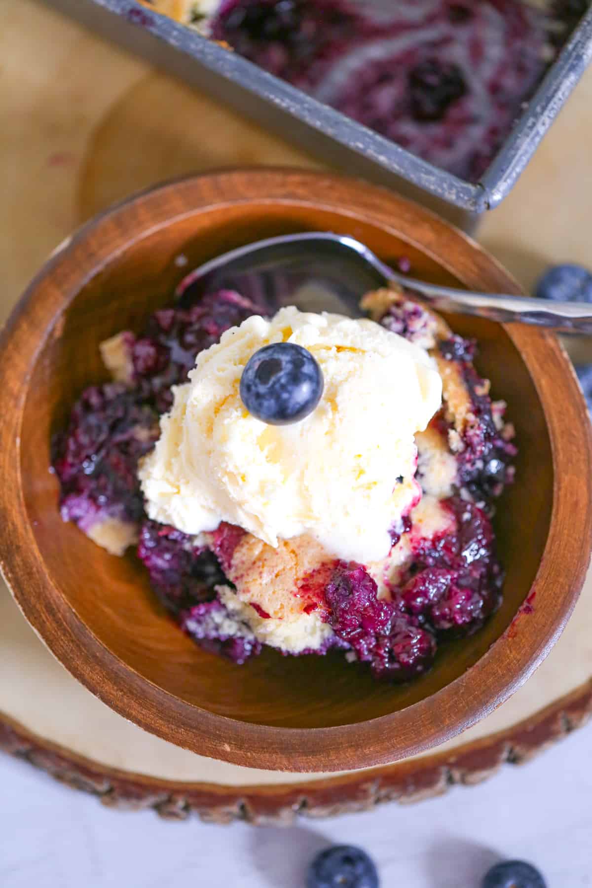 easy homemade blueberry cobbler recipe with warm buttery biscuit, cake-like crust and juicy blueberries filling