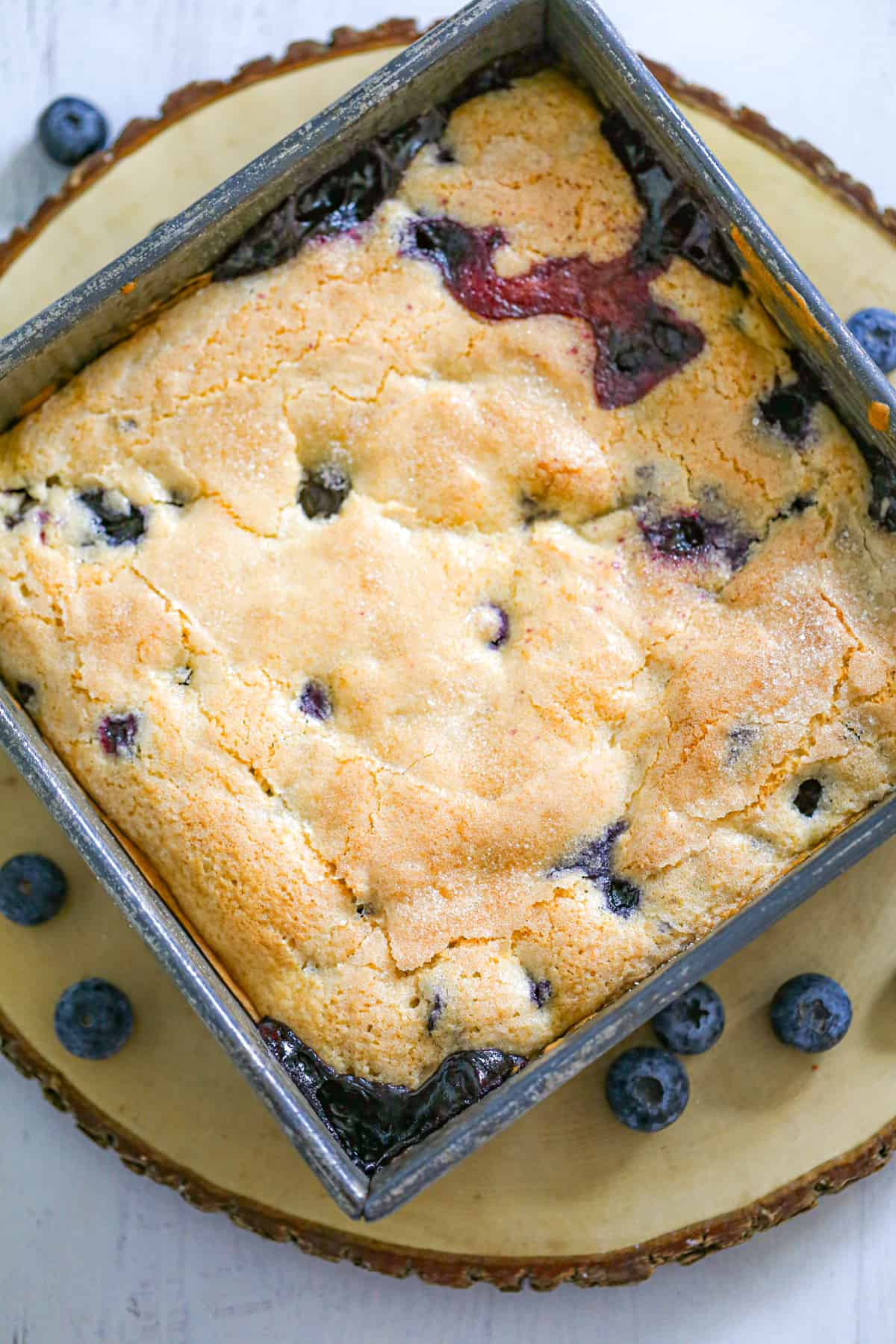 easy homemade blueberry cobbler recipe with warm buttery biscuit, cake-like crust and juicy blueberries filling