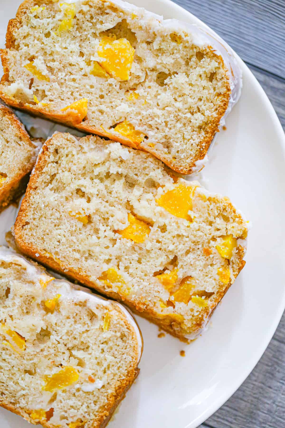 slices of the Easiest Peach Cobbler Bread recipe