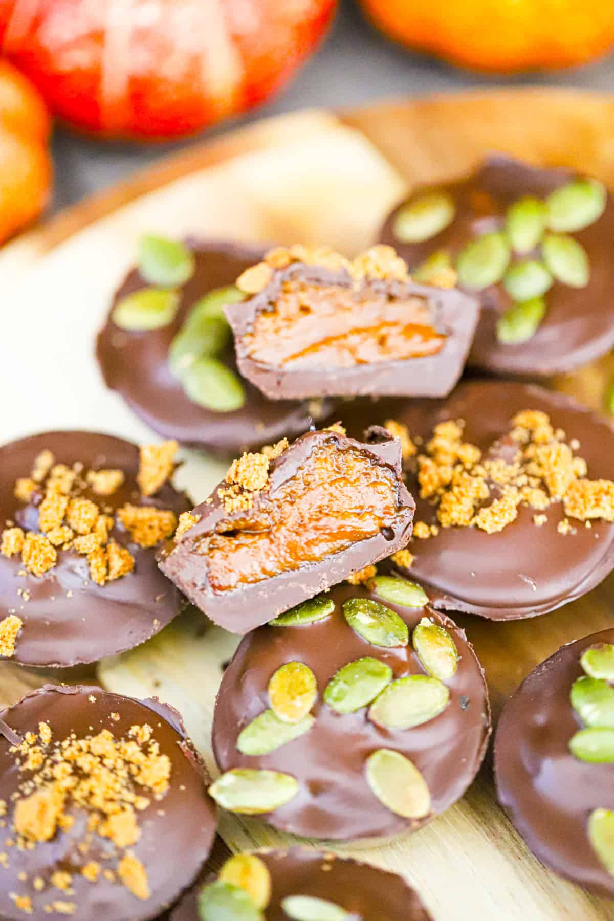 Indulge the ultimate cookie butter fall treat with this No Bake Chocolate Biscoff Pumpkin Cups recipe. Easy to make with just 4 ingredients!