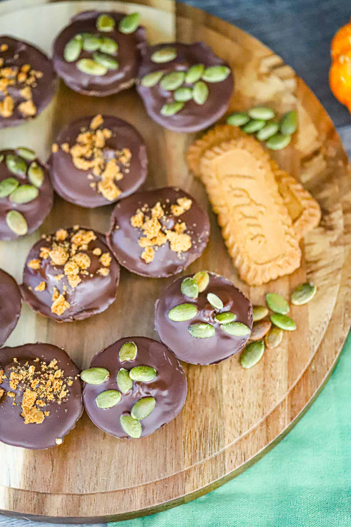 Indulge the ultimate cookie butter fall treat with this No Bake Chocolate Biscoff Pumpkin Cups recipe. Easy to make with just 4 ingredients!