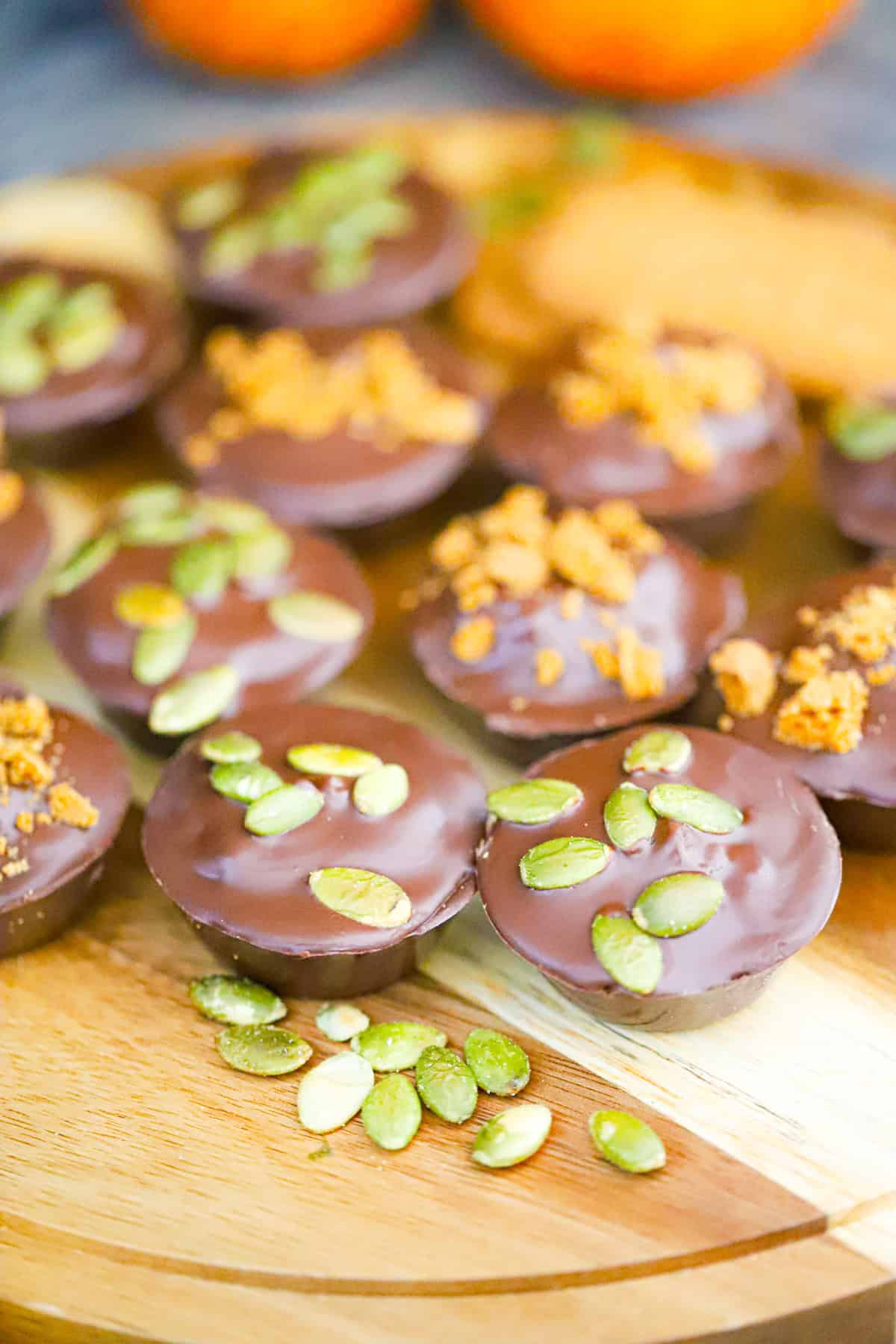 Indulge the ultimate cookie butter fall treat with this No Bake Chocolate Biscoff Pumpkin Cups recipe. Easy to make with just 4 ingredients!