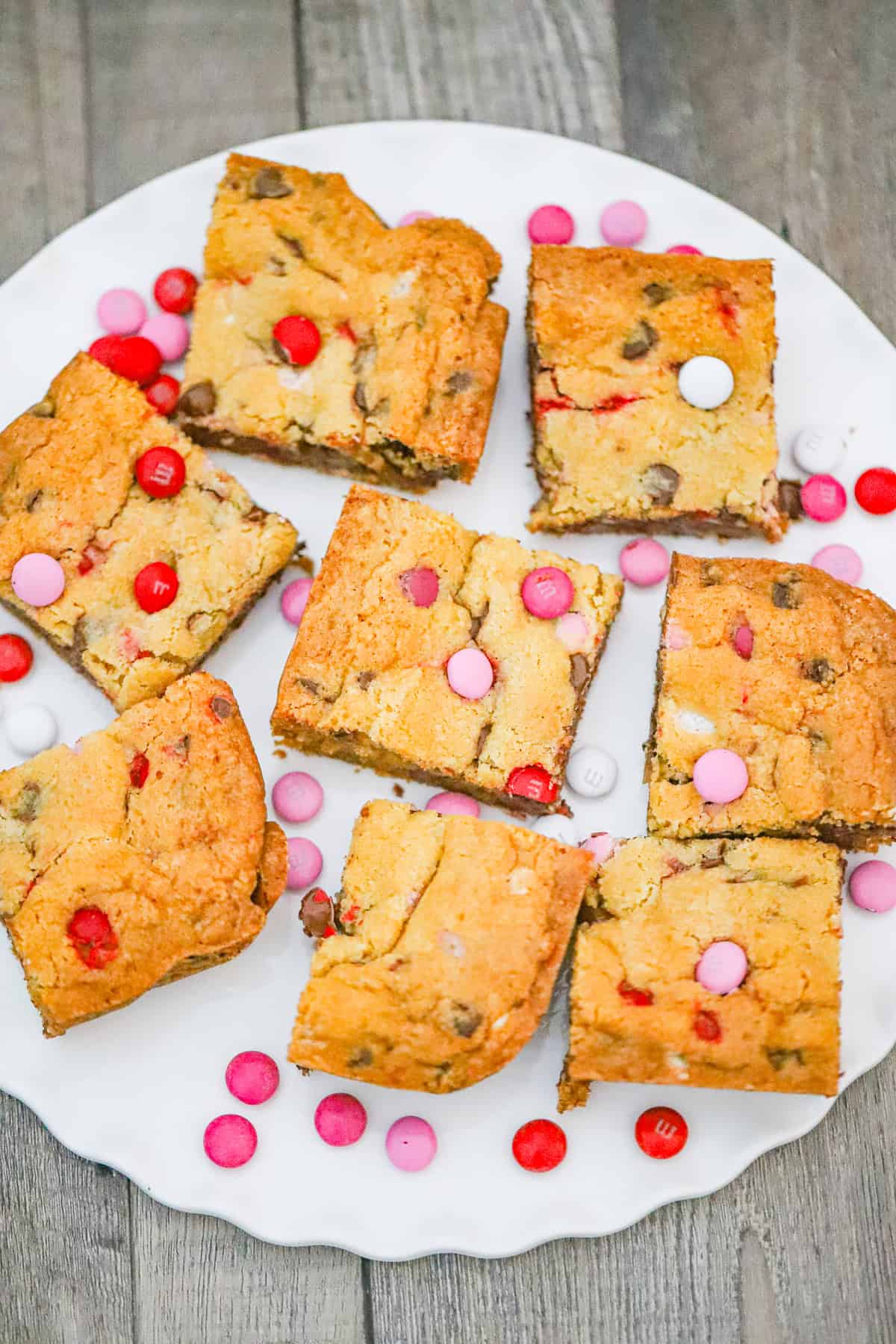 Thick & Delish Valentine M&M Bars recipe for Valentine's day, cookie bars you'll love!