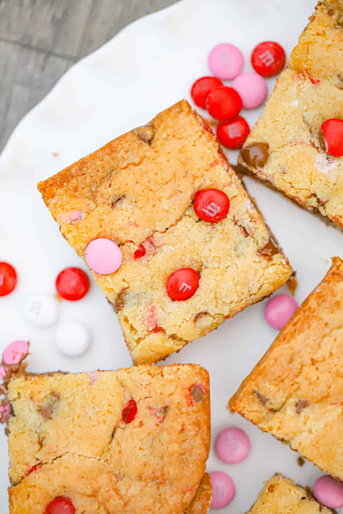 Thick & Delish Valentine M&M Bars recipe for Valentine's day, cookie bars you'll love!